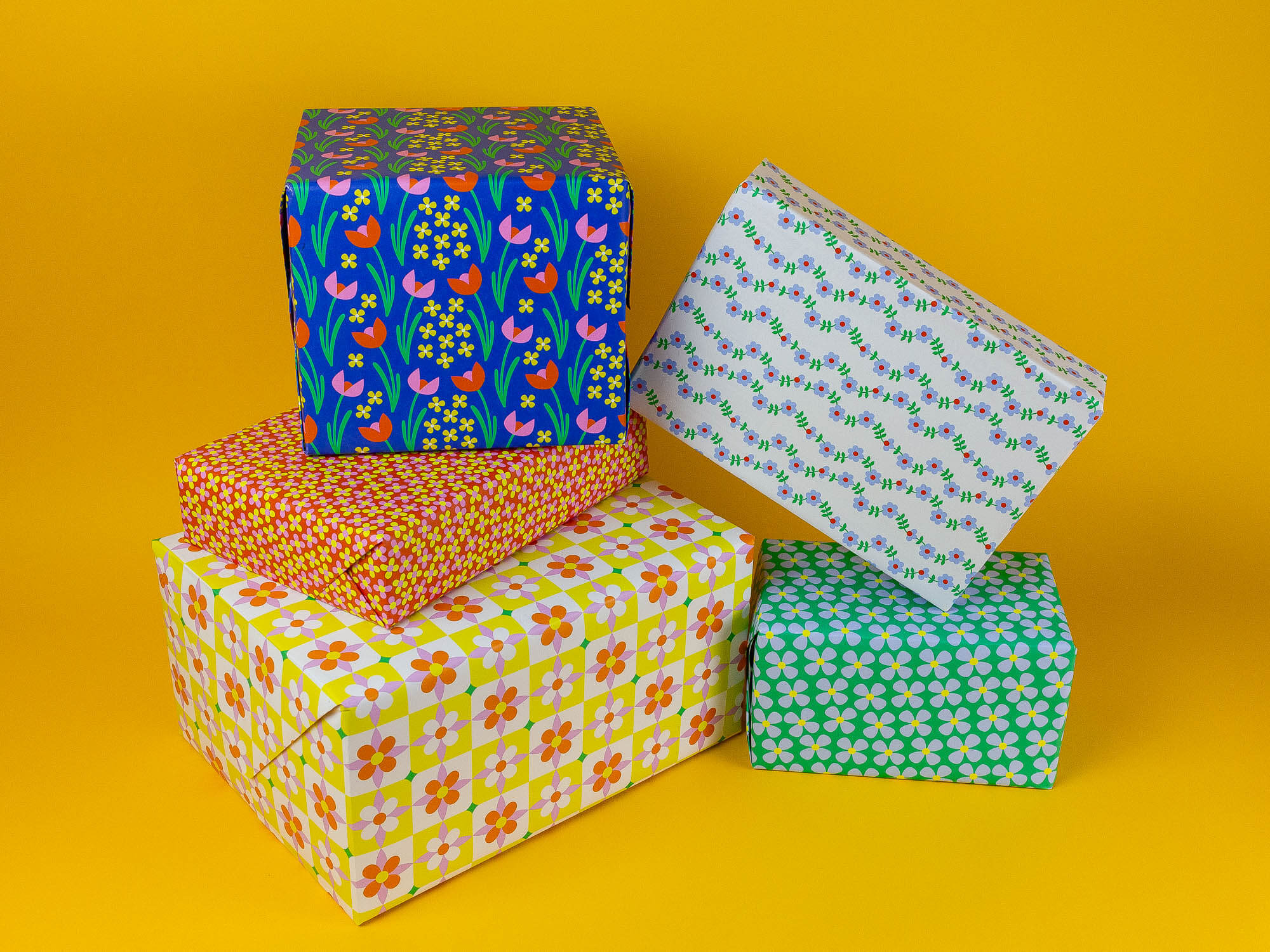 a group of wrapped presents sitting on top of each other