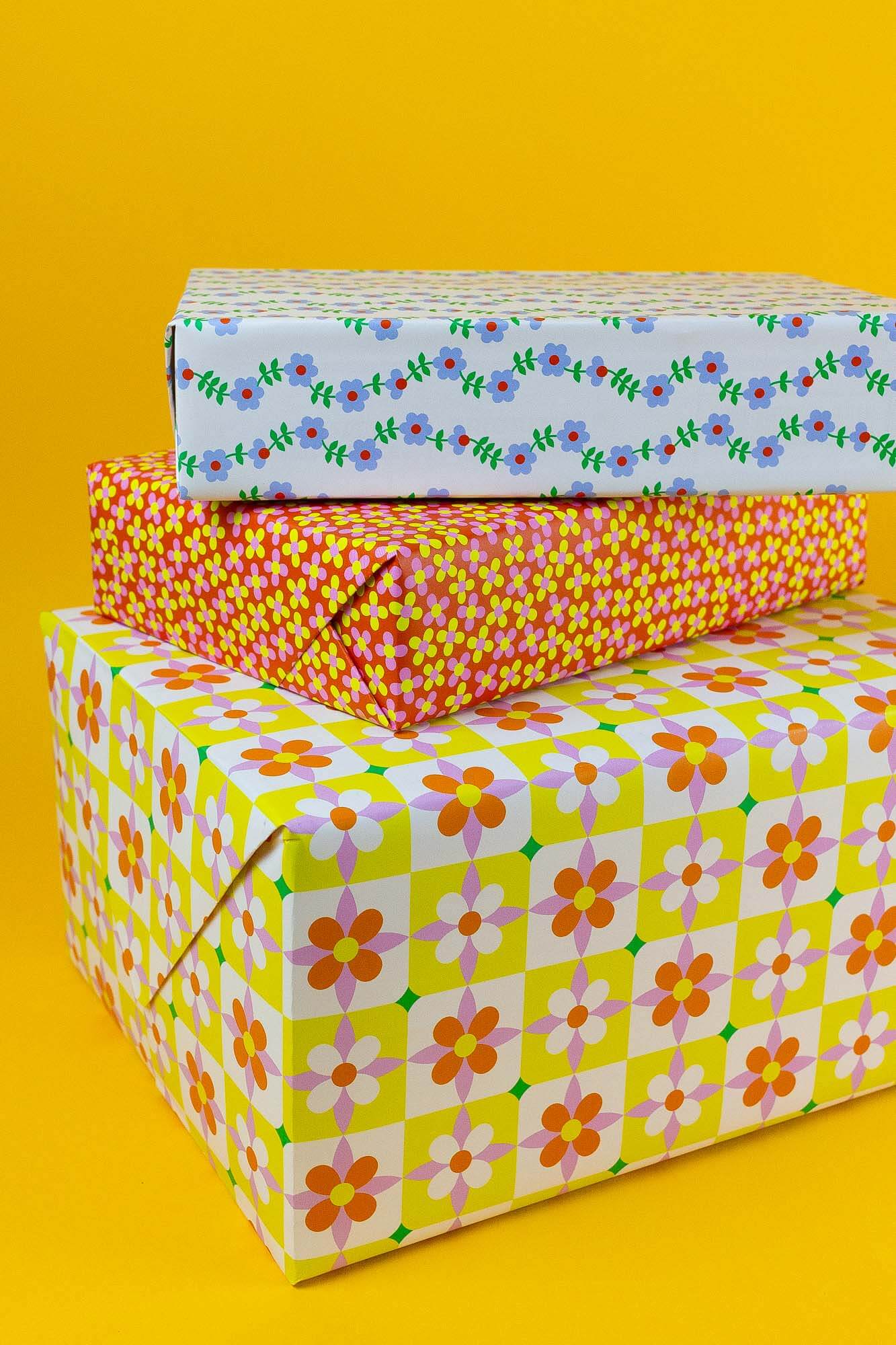 three boxes are stacked on top of each other