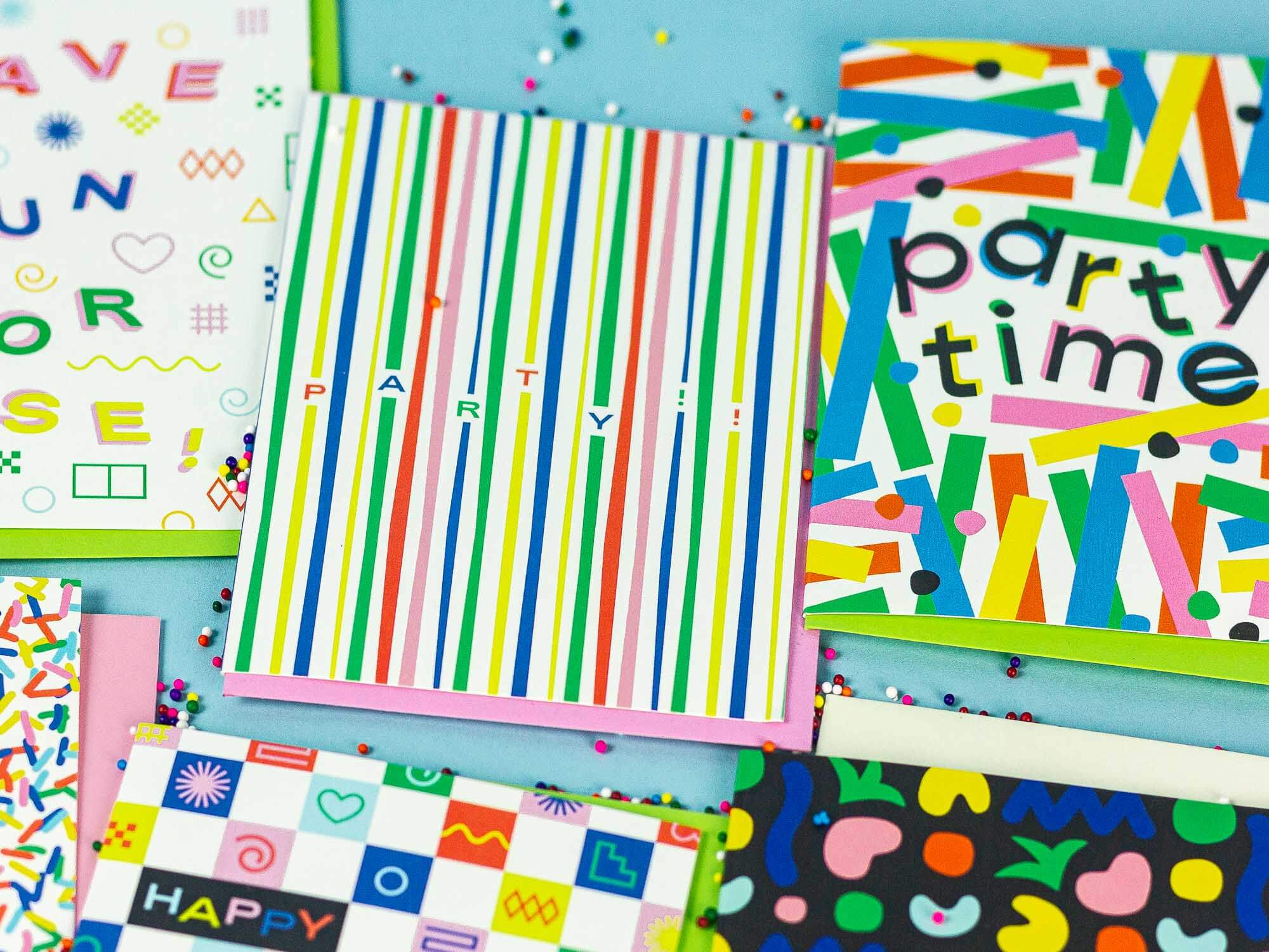 a bunch of colorful papers that are on a table