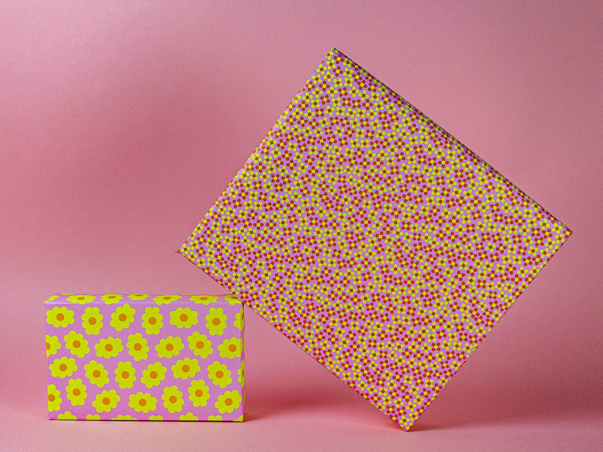 a pink and yellow box with a polka dot design