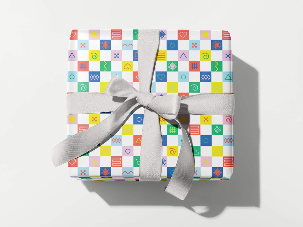 Colorful, modern, gift wrapping sheets with fun prints, patterns, and geometric shapes by @mydarlin_bk. Made in USA.