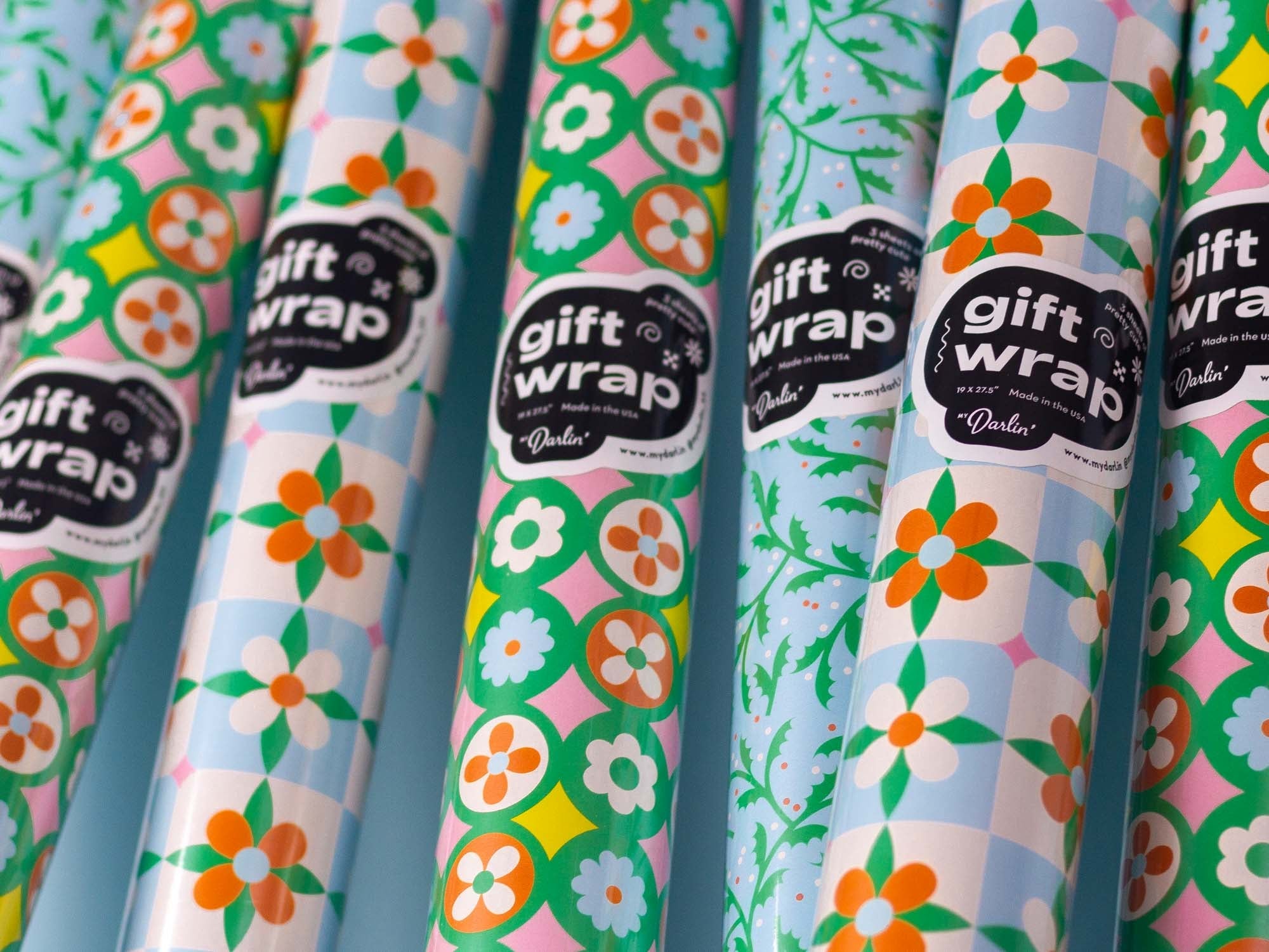 3 sheets of pretty cute gift wrap sticker detail on rolls of retro floral holiday gift wrap. By @mydarlin_bk Made in the USA