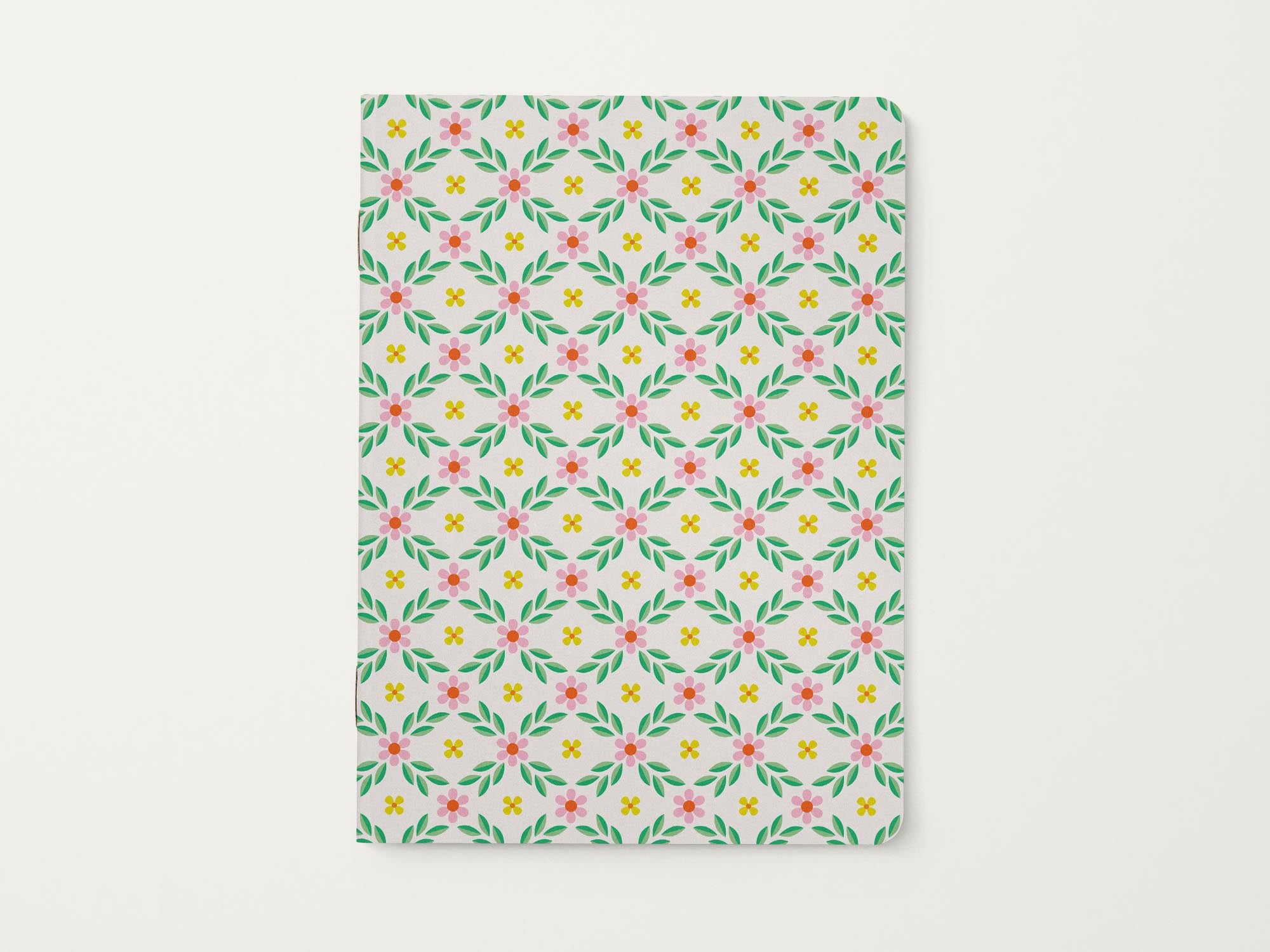 Notebook with a pink and green retro grandma floral pattern on a white background