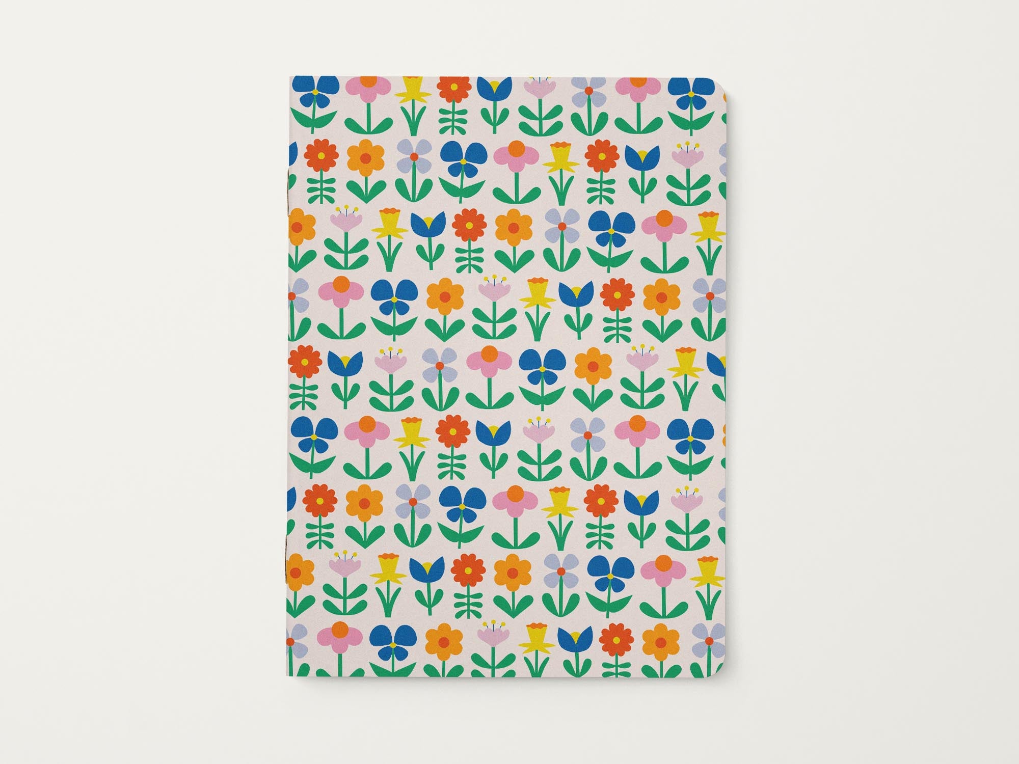 Notebook with a colorful retro floral pattern on a white background