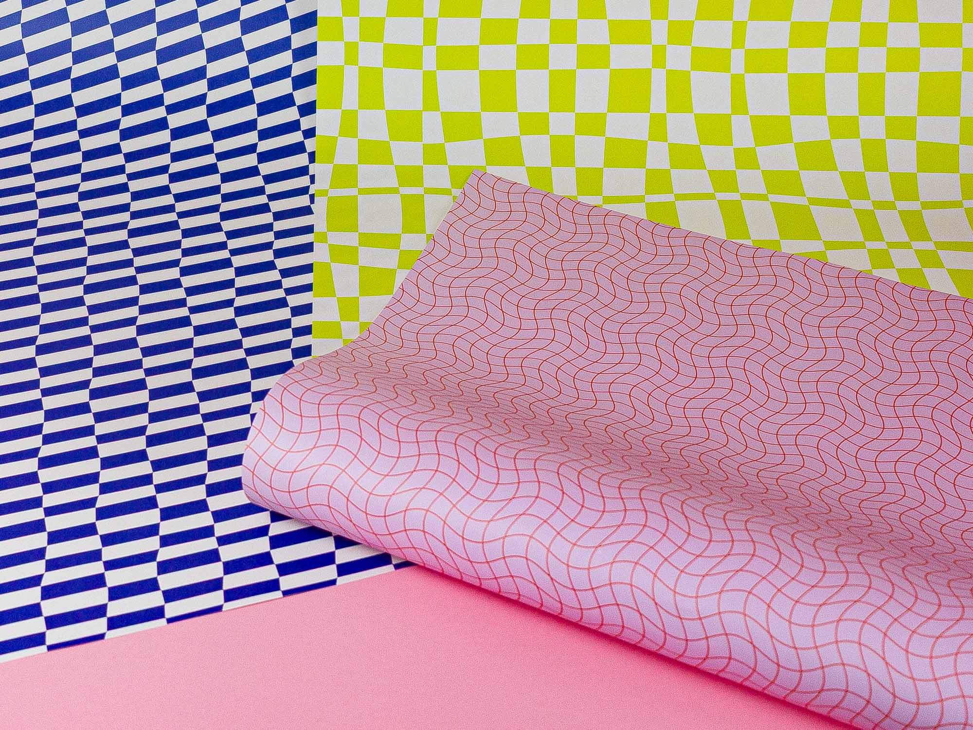 a close up of a wall with different patterns on it
