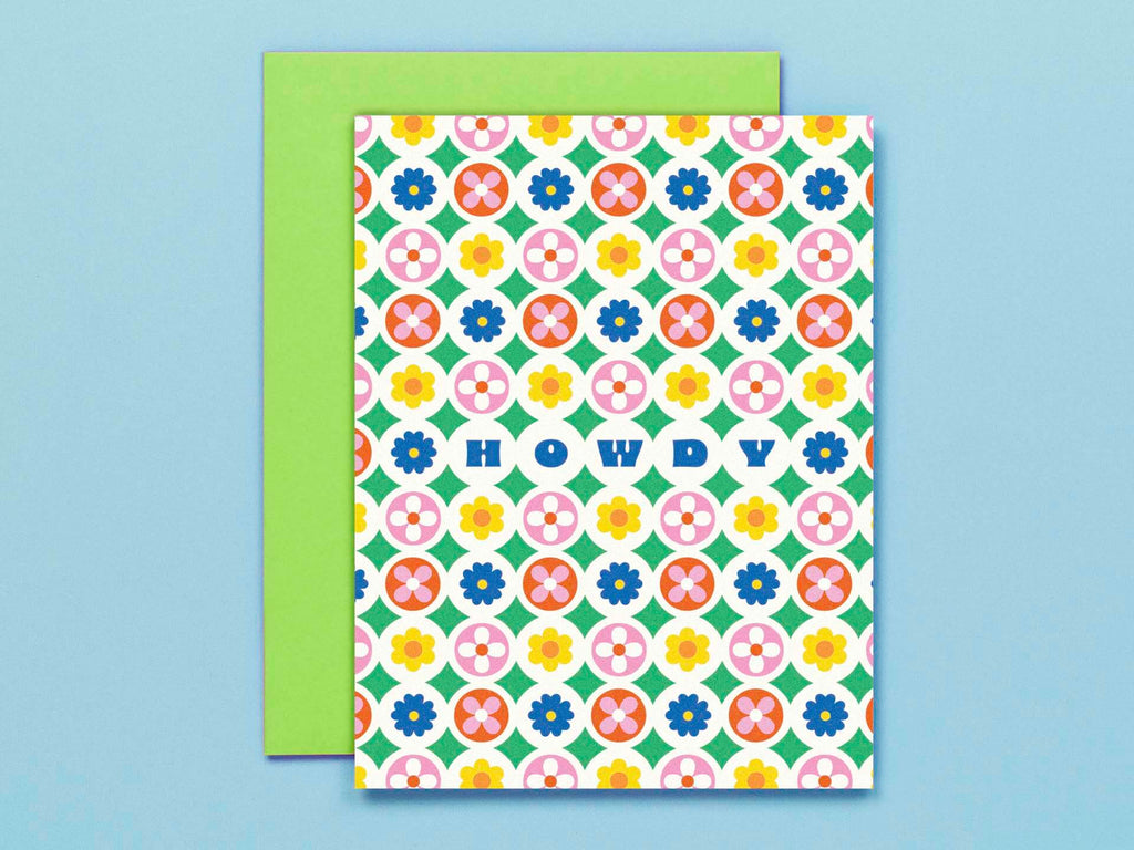 a card with a colorful flower pattern on it
