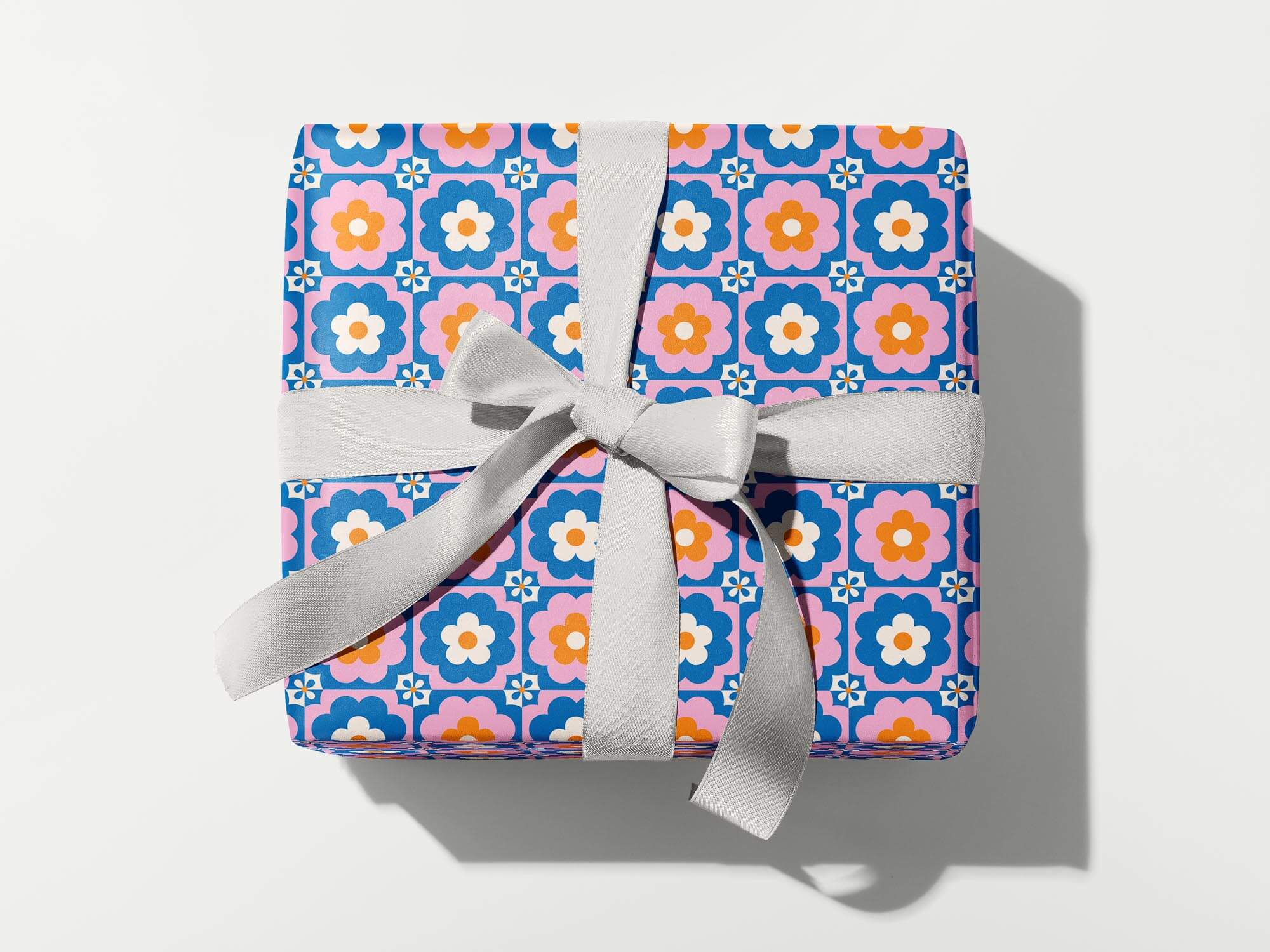 a wrapped gift with a bow on a white background