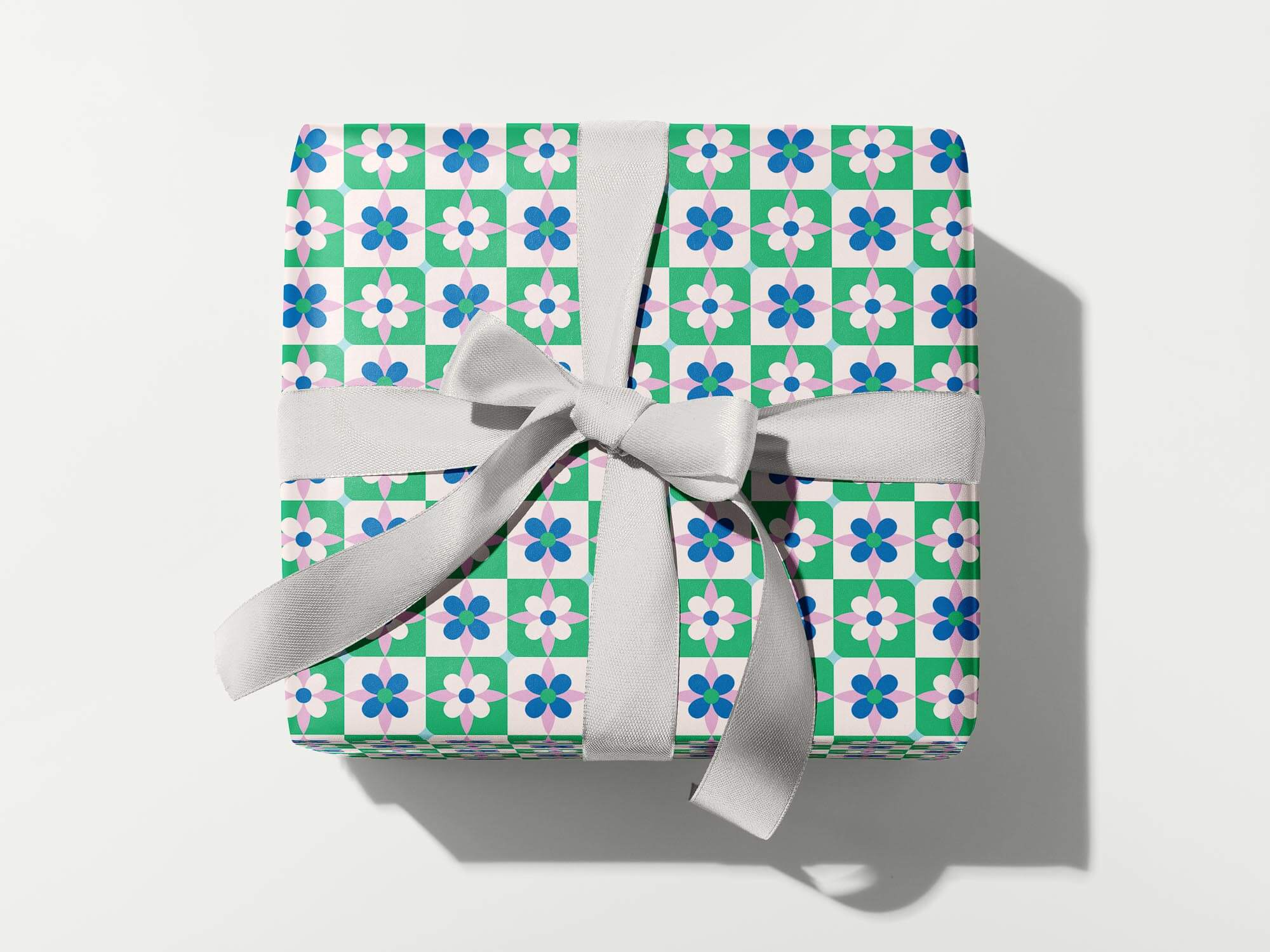 a wrapped gift with a bow on a white background