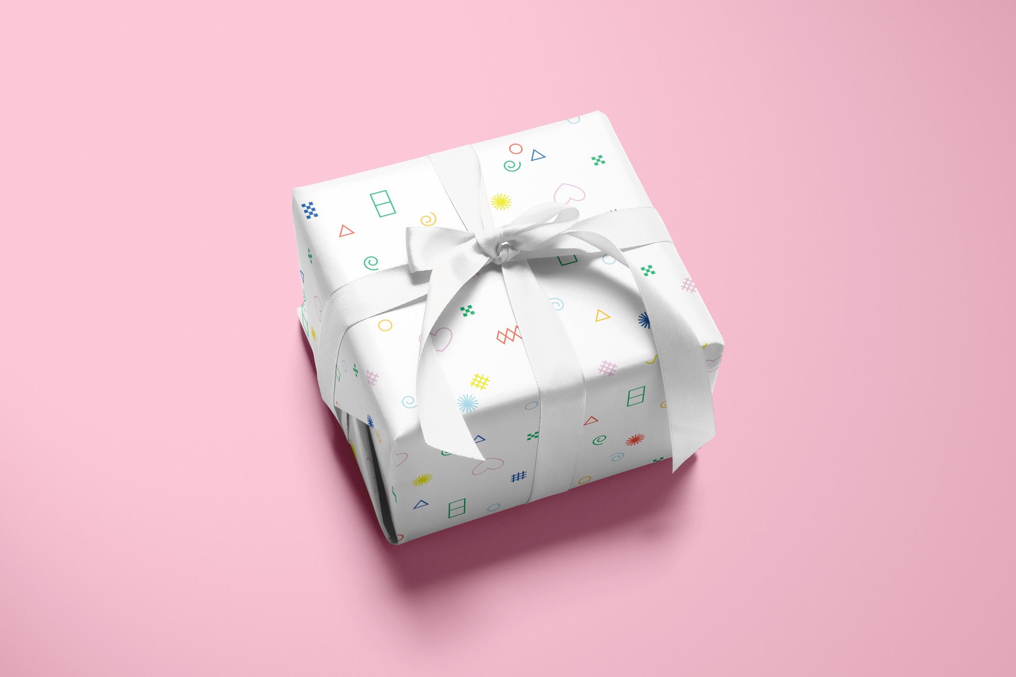 Colorful, modern, gift wrapping sheets with fun prints, patterns, and geometric shapes by @mydarlin_bk. Made in USA.