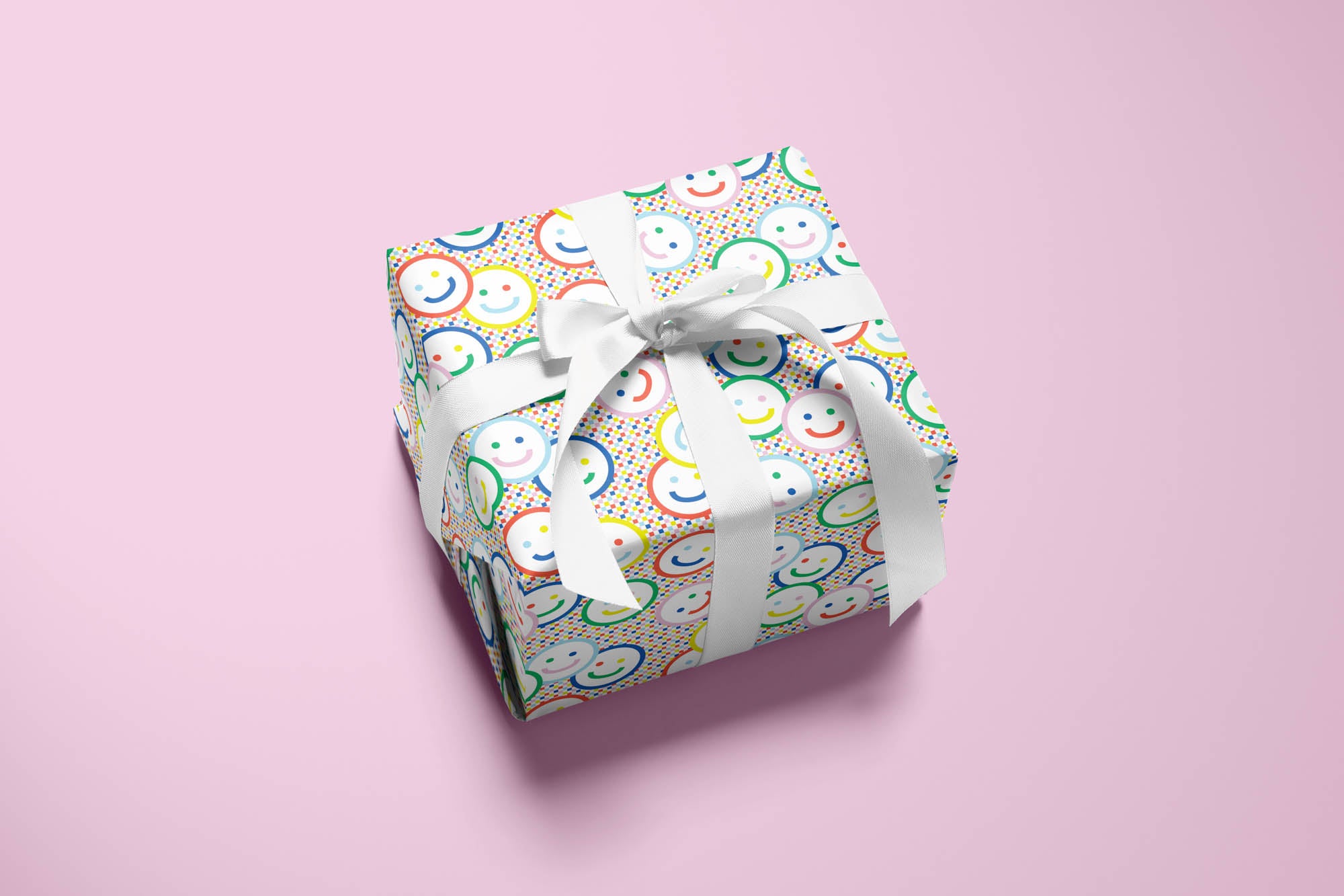 Rainbow smiley face and checker pattern wrapping paper. Colorful, modern, gift wrapping sheets with fun prints and patterns by @mydarlin_bk. Made in USA.