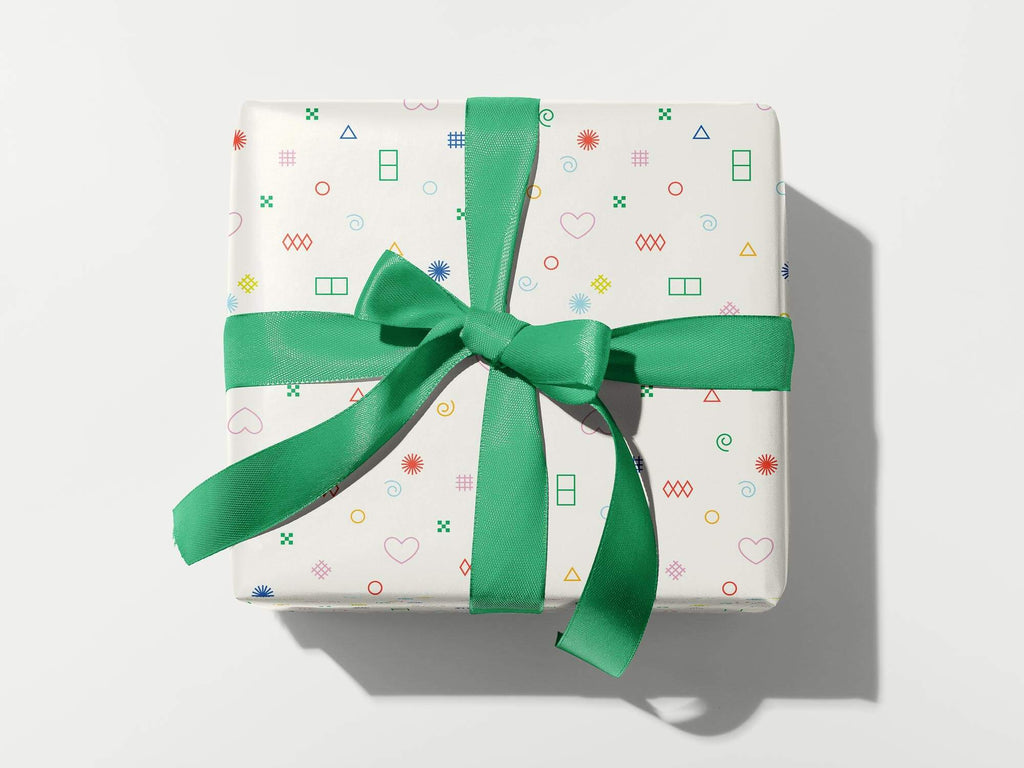 Colorful, modern, gift wrapping sheets with fun prints, patterns, and geometric shapes by @mydarlin_bk. Made in USA.