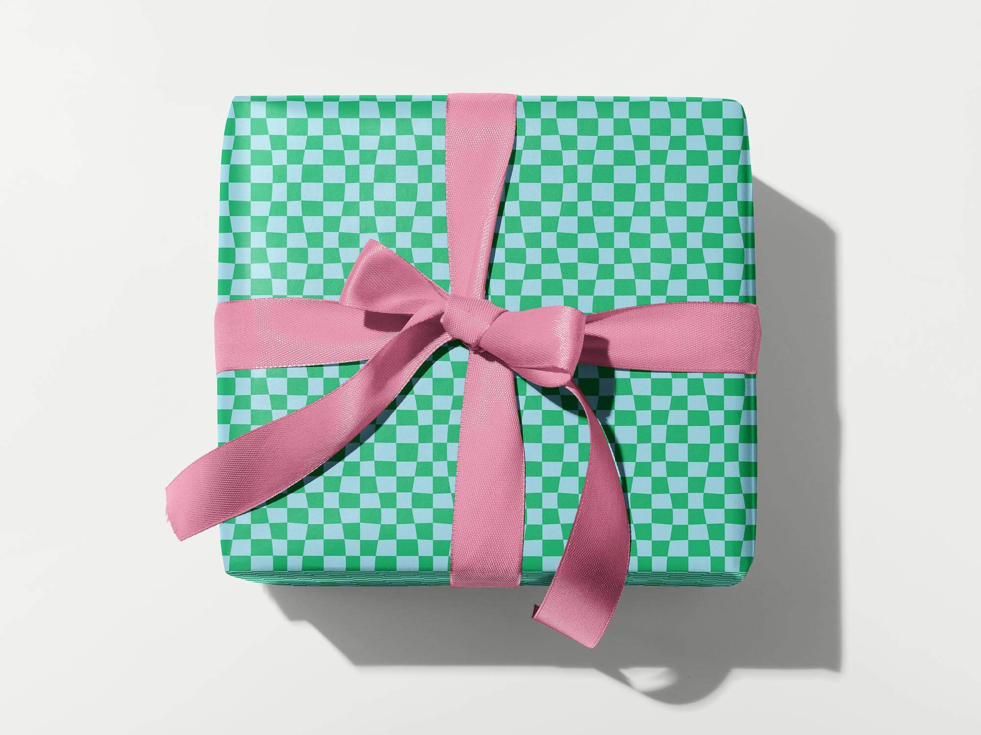 Chunky Checker green and blue wavy checkerboard pattern wrapping paper. Colorful, modern, gift wrapping sheets with fun prints and patterns by @mydarlin_bk. Made in USA.