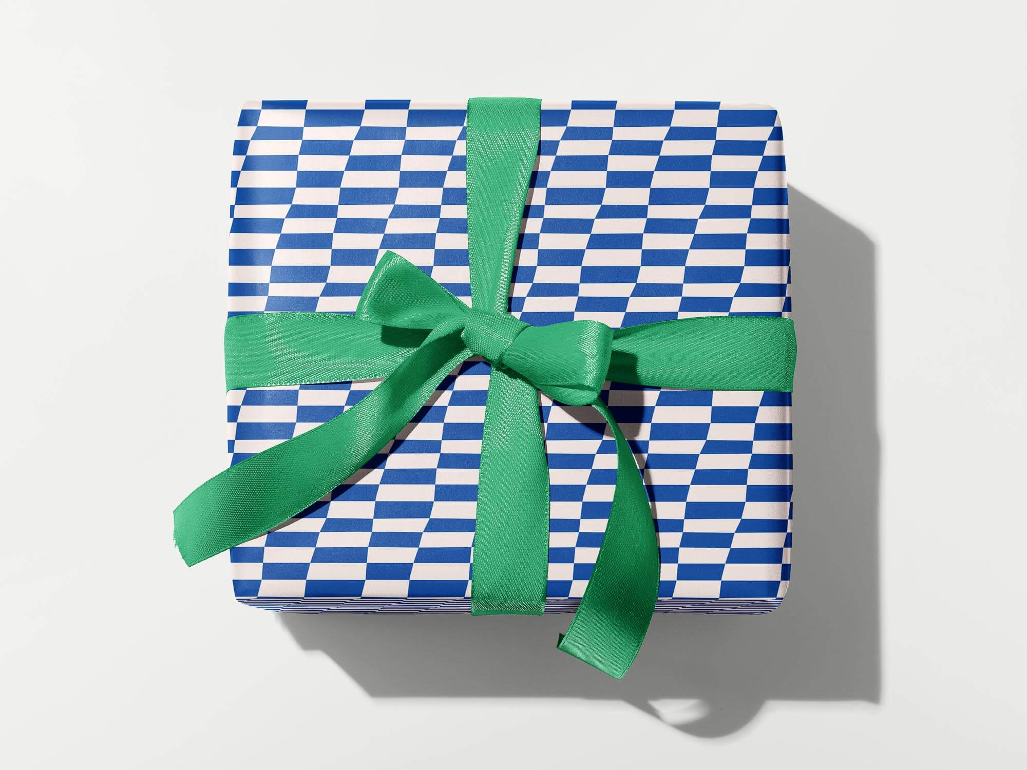 Lean Ennui blue and white leaning checkerboard pattern wrapping paper. Colorful, modern, gift wrapping sheets with fun prints and patterns by @mydarlin_bk. Made in USA.