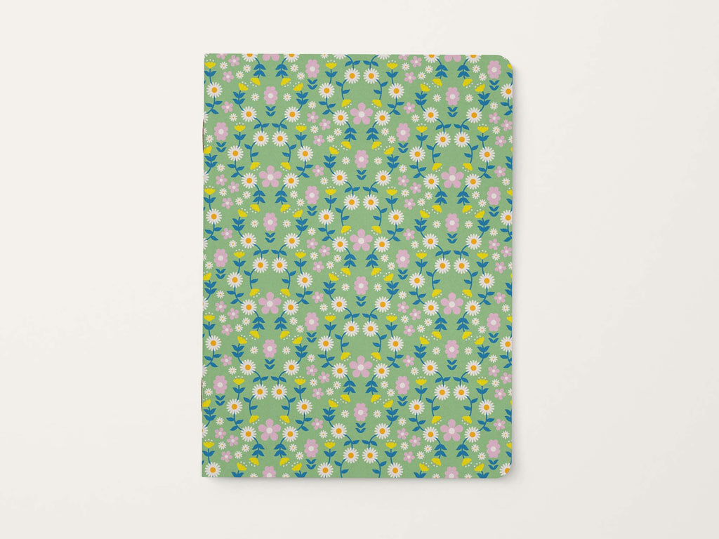 Retro Scandinavian inspired floral patterned notebook on a light green background