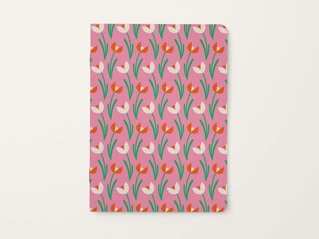 Notebook with retro floral tulip pattern on a pink background
