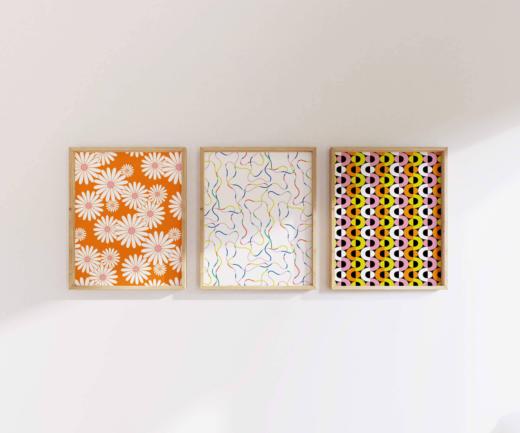 Gallery wall of colorful, modern daisies, graphic florals, squiggles, geometric, and abstract archival giclée art prints. Made in USA by My Darlin' @mydarlin_bk