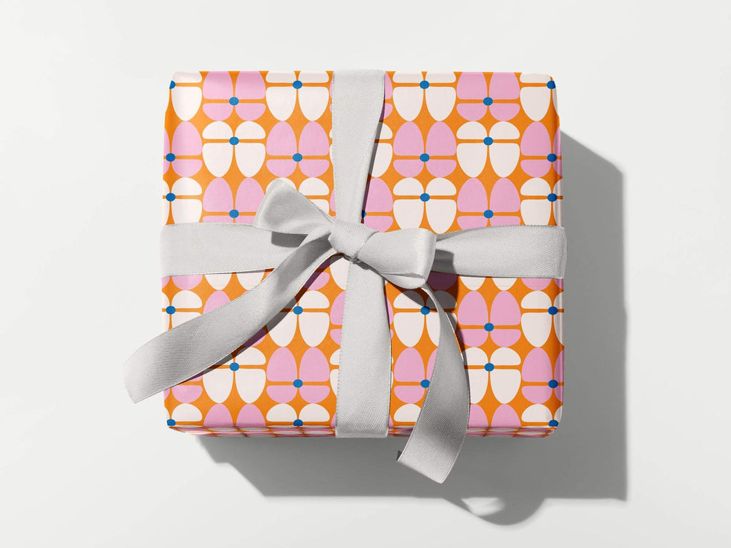 a wrapped gift with a bow on a white background