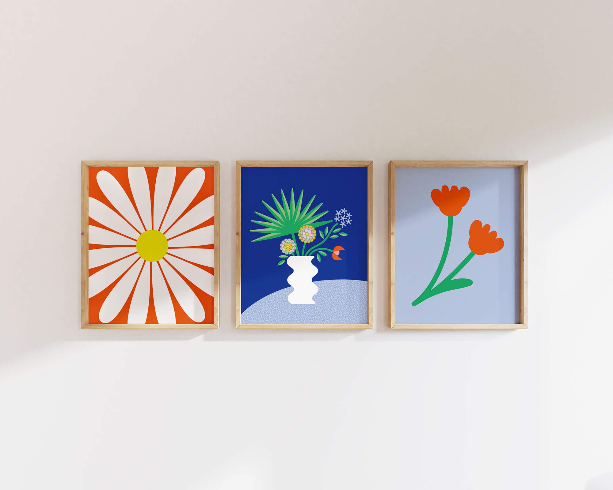 Group of three contemporary floral art prints gallery wall. Graphic, bold red and blue flower posters with vaguely mid-century inspired art. Made in USA by My Darlin' @mydarlin_bk