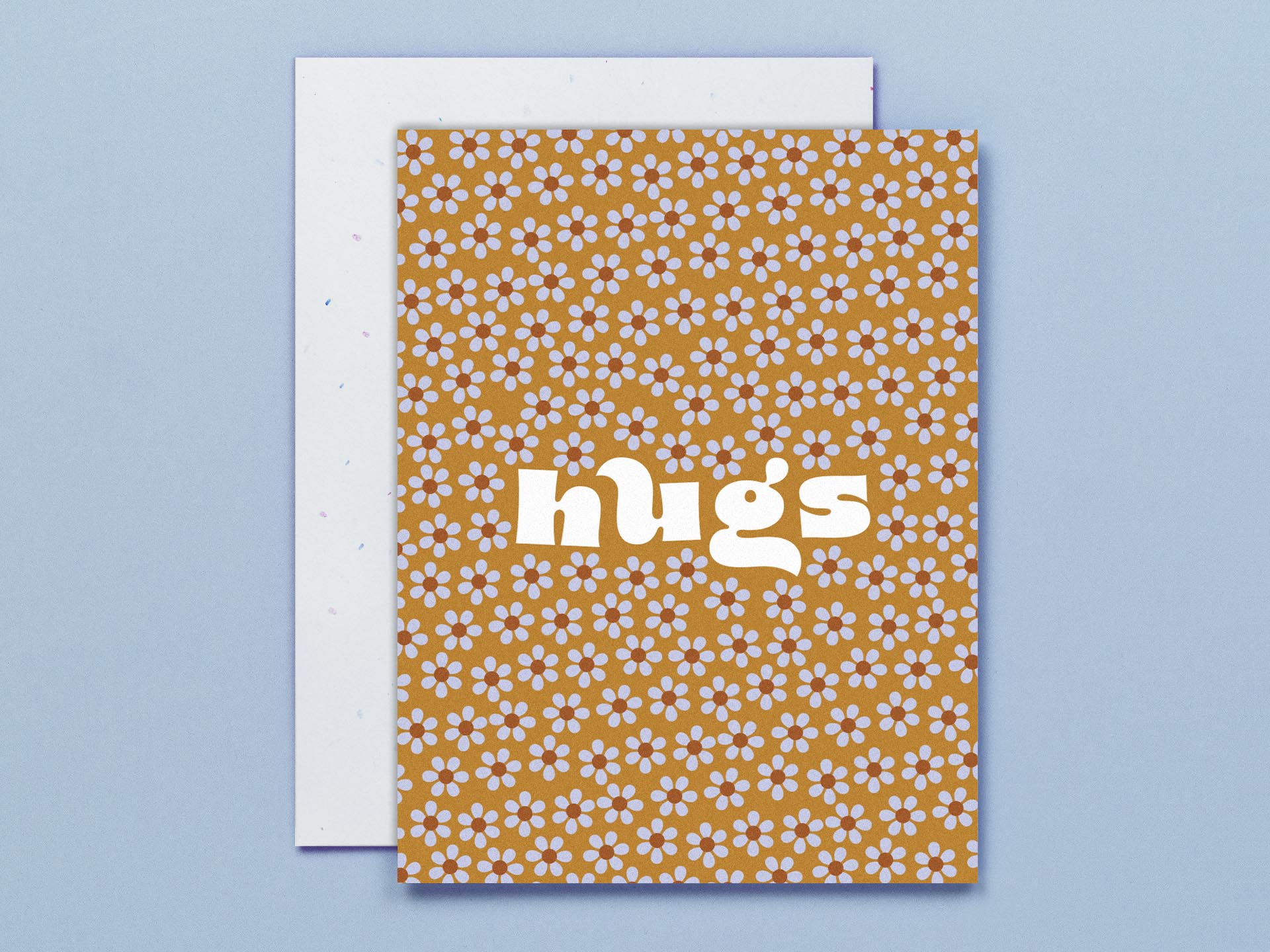 a greeting card with the word hugs printed on it