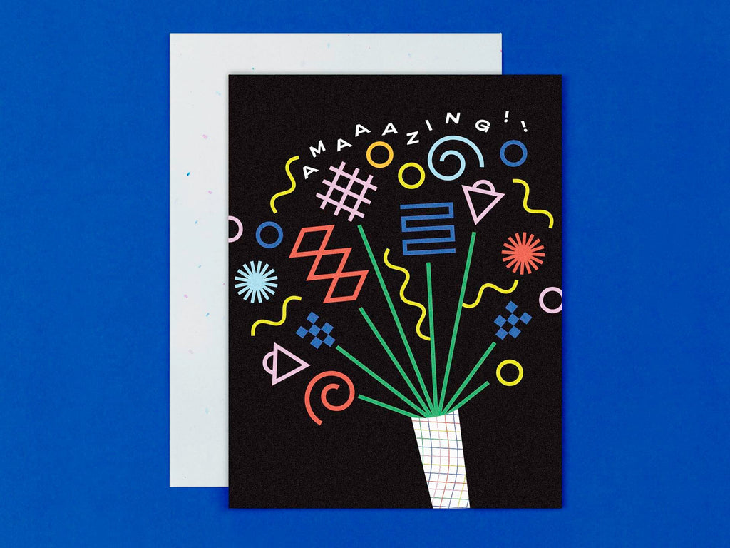 Colorful, abstract, geometric shape illustration of flowers or fireworks – you decide! Reads "amaaazing!!" for congratulations or general celebrations. Made in USA by @mydarlin_bk.